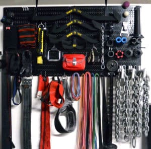 Black gym wall control pegboard