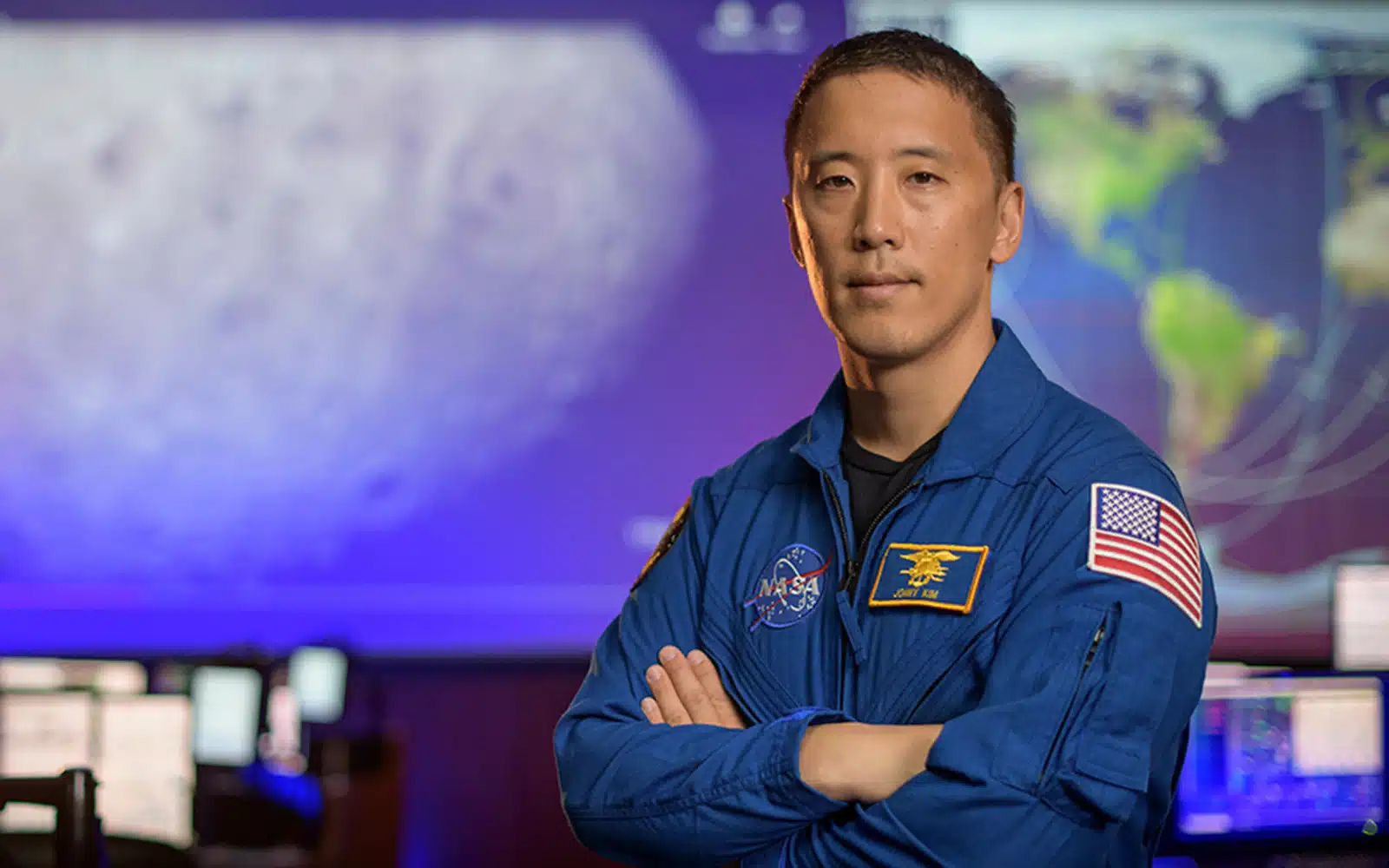 Polymath Jonny Kim poses in NASA uniform